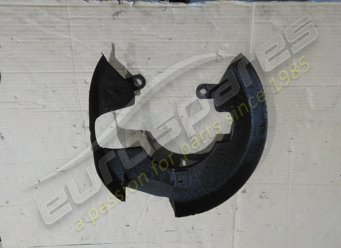 used ferrari rh brake disc shield. part number 104596 (2)