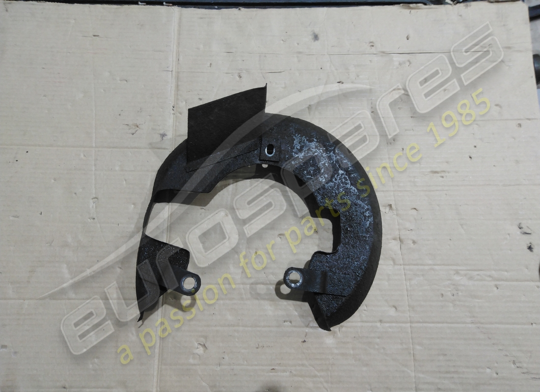 used ferrari rh brake disc shield. part number 104596 (1)