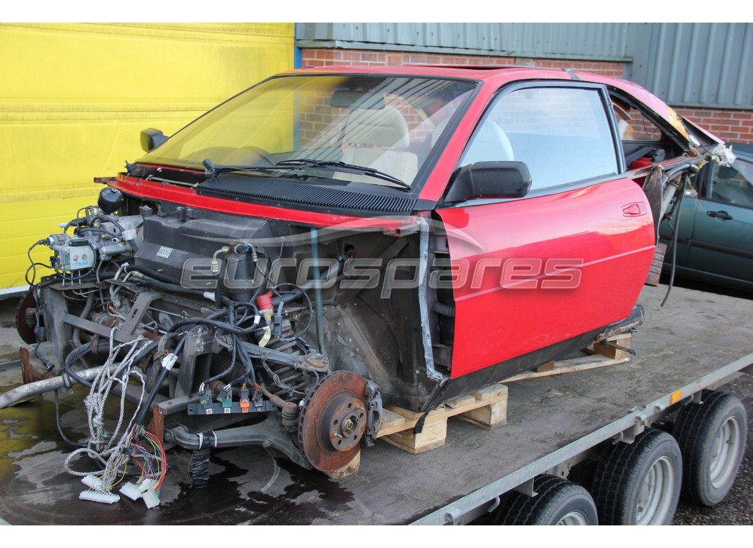 ferrari mondial 3.4 t coupe/cabrio being prepared for dismantling at eurospares