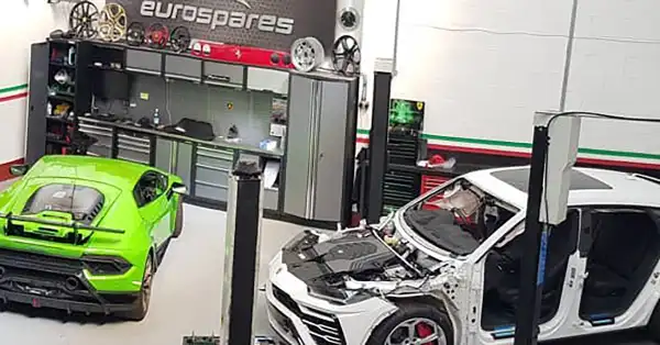 Two Lamborghinis being dismantled in the Eurospares workshop.
