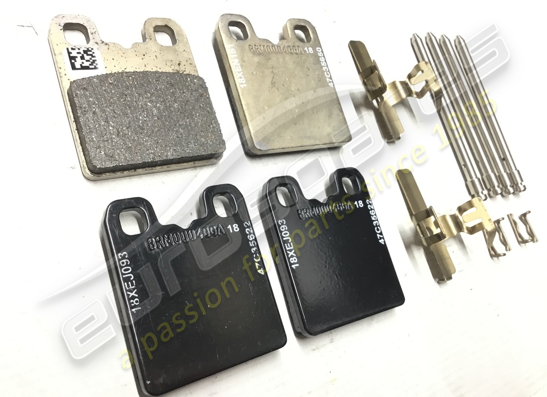 NEW FERRARI SET OF EPB PADS. PART NUMBER 70004343 (3) new ferrari set of epb pads. part number 70004343 (3)