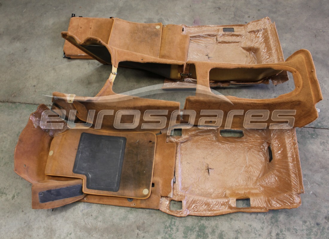 USED FERRARI COMPLETE SET OF PASSENGER COMPARTMENT MATS. PART NUMBER 697802.. (1) used ferrari complete set of passenger compartment mats. part number 697802.. (1)