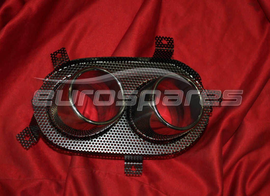NEW FERRARI LH TAILPIPE GRILLE. PART NUMBER 86090500 (1) new ferrari lh tailpipe grille. part number 86090500 (1)