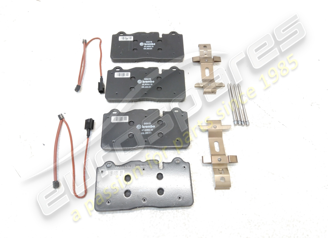 NEW FERRARI FRONT PAD SET WITH SPRING. PART NUMBER 70001840 (2) new ferrari front pad set with spring. part number 70001840 (2)