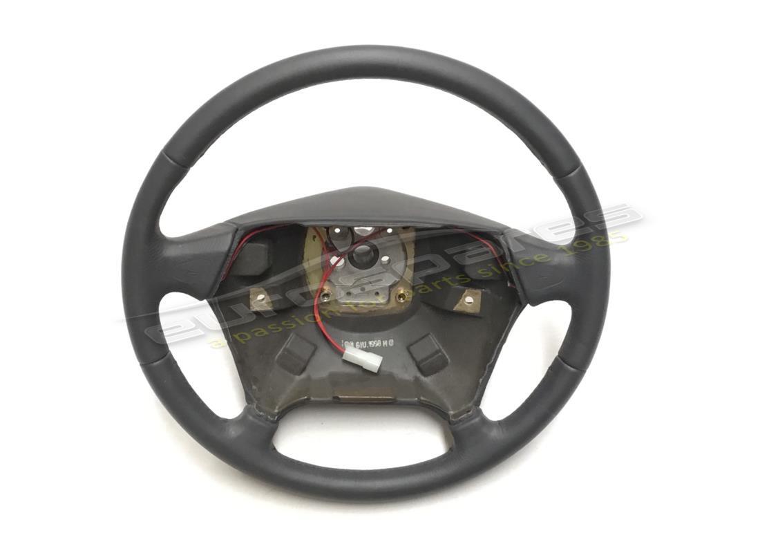 NEW FERRARI STEERING WHEEL IN DK BLUE LEATHER 3282. PART NUMBER 65846502 (1) new ferrari steering wheel in dk blue leather 3282. part number 65846502 (1)