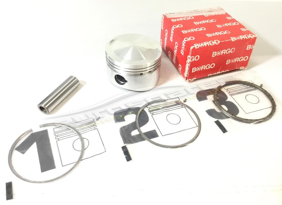 NEW FERRARI COMPLETE PISTON WITH RINGS. PART NUMBER 100165B (1) new ferrari complete piston with rings. part number 100165b (1)
