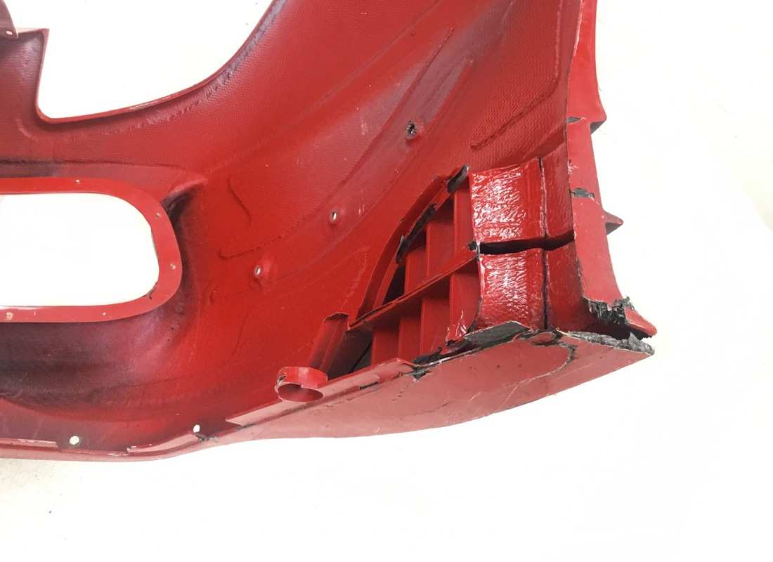 DAMAGED FERRARI FRONT BUMPER. PART NUMBER 89399000 (4) damaged ferrari front bumper. part number 89399000 (4)