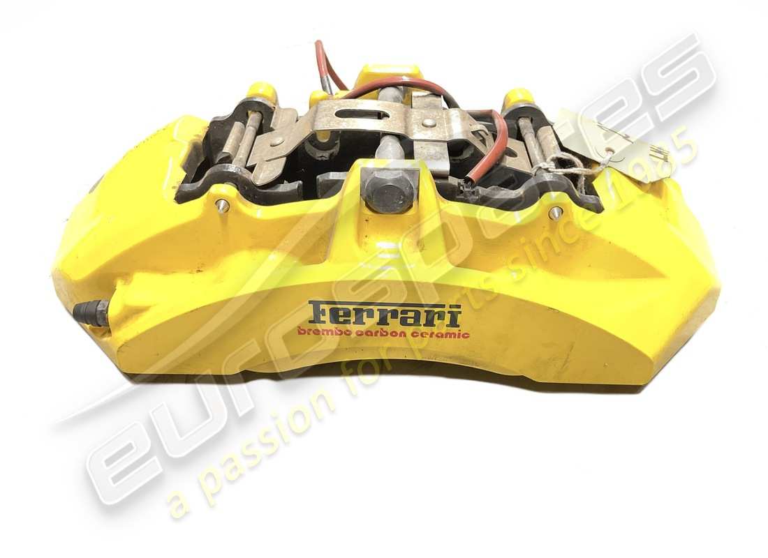 USED FERRARI FRONT LH CALIPER WITH PADS. PART NUMBER 278840 (1) used ferrari front lh caliper with pads. part number 278840 (1)