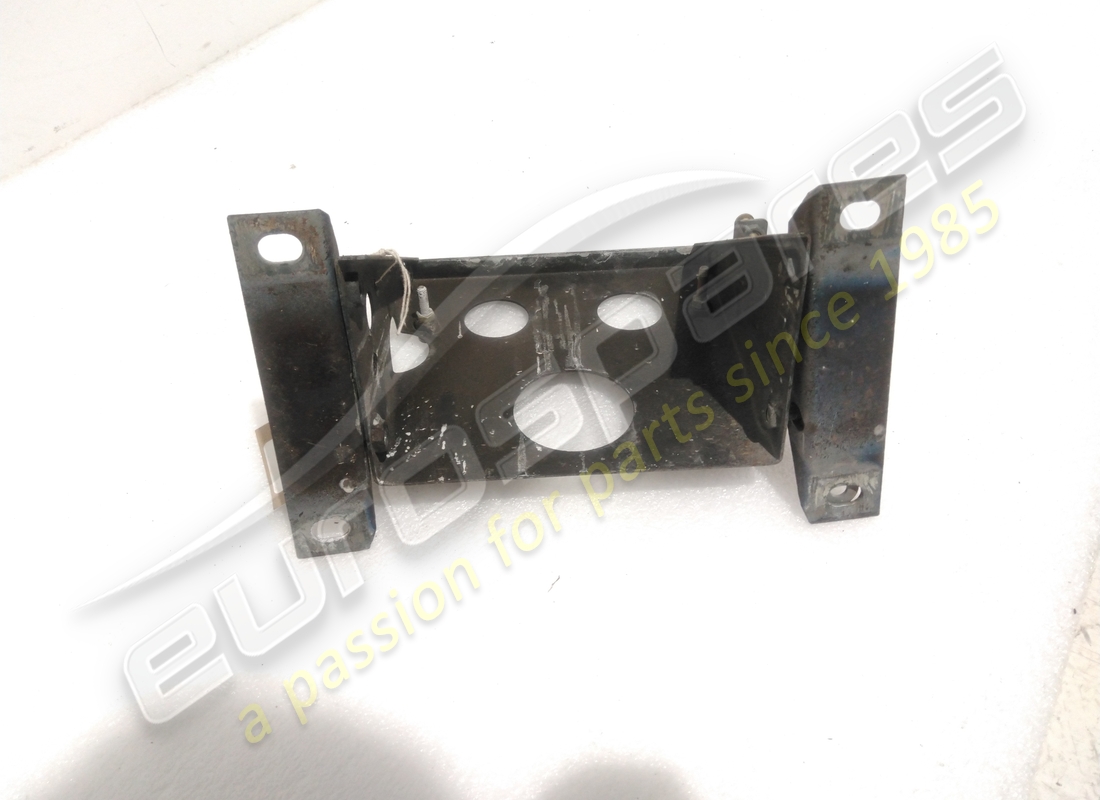 USED FERRARI RH HEAD LAMP MOTOR SUPPORT BRACKET. PART NUMBER 60648000 (3) used ferrari rh head lamp motor support bracket. part number 60648000 (3)
