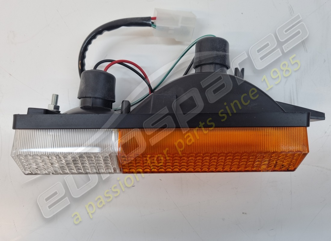 NEW FERRARI LH FRONT INDICATOR & SIDE LAMP UNIT WITH ORANGE/CLEAR LENS. PART NUMBER 60121100 (2) new ferrari lh front indicator & side lamp unit with orange/clear lens. part number 60121100 (2)