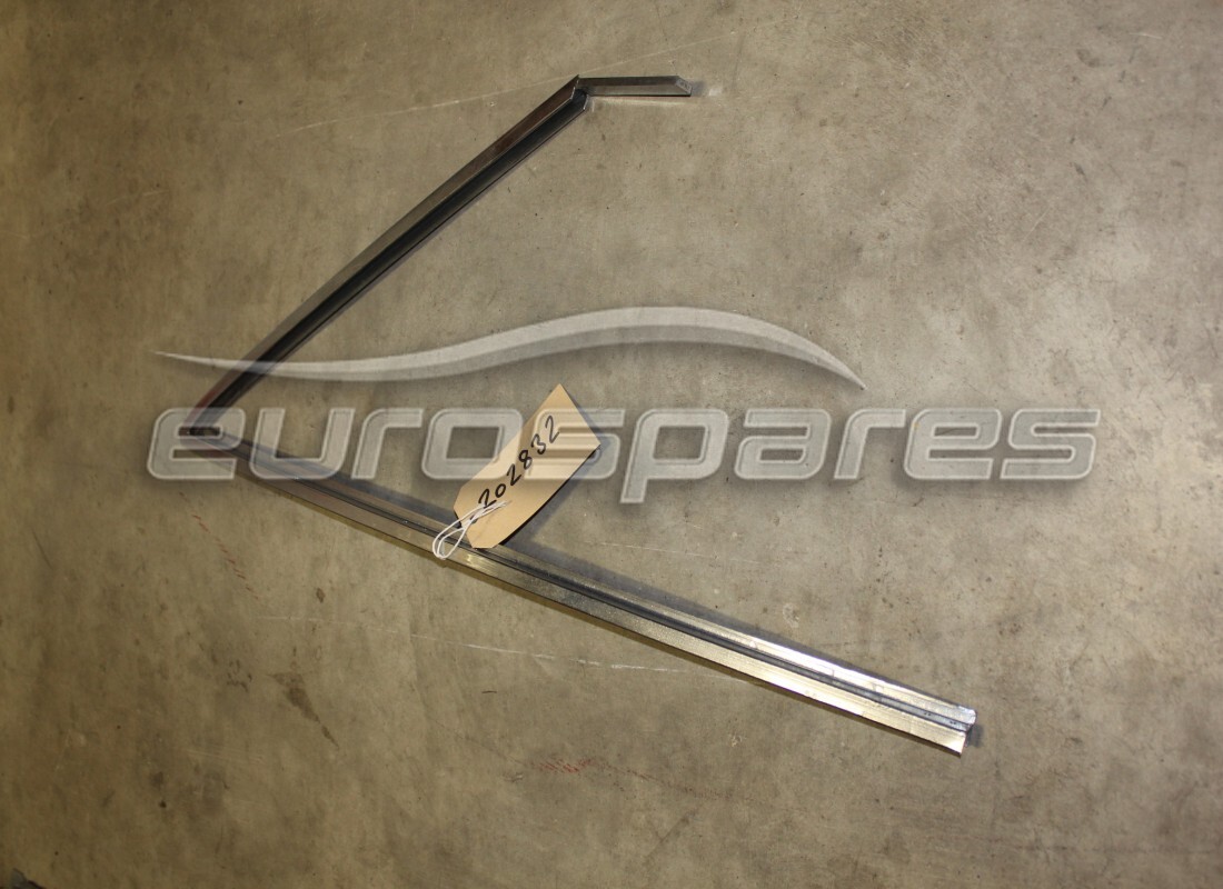 NEW FERRARI RH FRONT QUARTER GLASS FRAME. PART NUMBER 20283200 (1) new ferrari rh front quarter glass frame. part number 20283200 (1)