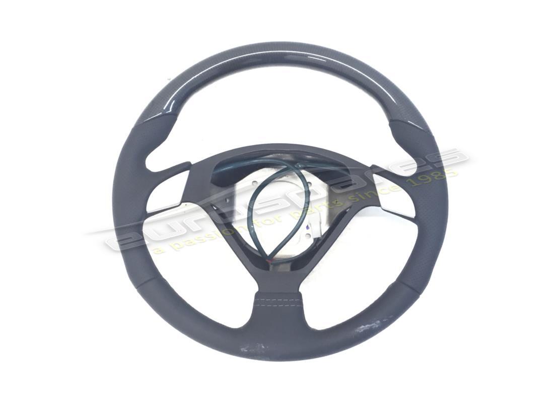 NEW (OTHER) FERRARI CARBON STEERING WHEEL. PART NUMBER 672876.. (1) new (other) ferrari carbon steering wheel. part number 672876.. (1)