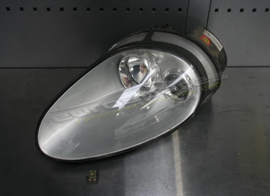 used maserati lh front headlight. part number 209681.. (1)