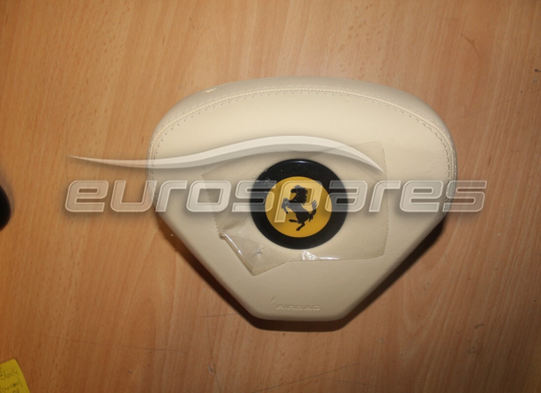 NEW FERRARI DRIVER SIDE AIRBAG CREAM. PART NUMBER 82023804 (1) new ferrari driver side airbag cream. part number 82023804 (1)