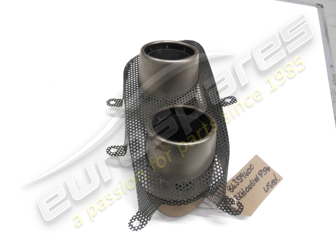 USED FERRARI GRILLE WITH RH TAILPIPES. PART NUMBER 84359400 (4) used ferrari grille with rh tailpipes. part number 84359400 (4)