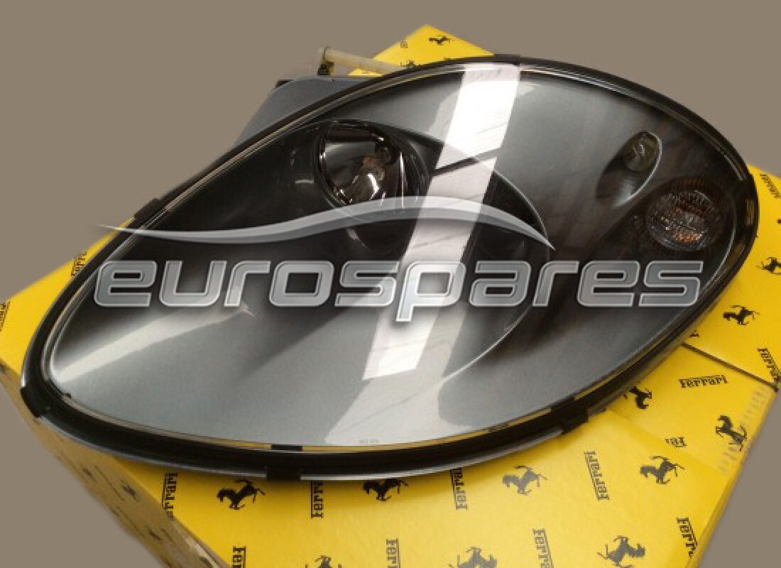 NEW FERRARI LH LAMP ASSEMBLY RHD TITANIUM. PART NUMBER 72001472 (1) new ferrari lh lamp assembly rhd titanium. part number 72001472 (1)