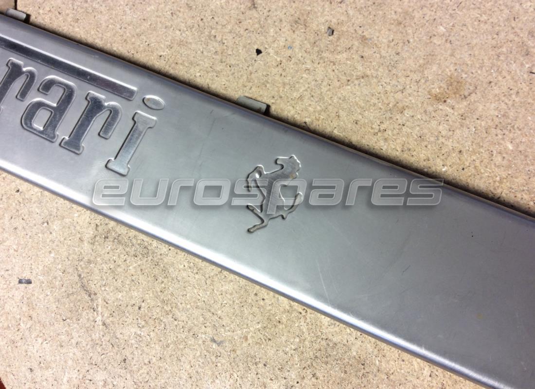 USED FERRARI RH KICK PLATE INSERT. PART NUMBER 65221600 (1) used ferrari rh kick plate insert. part number 65221600 (1)