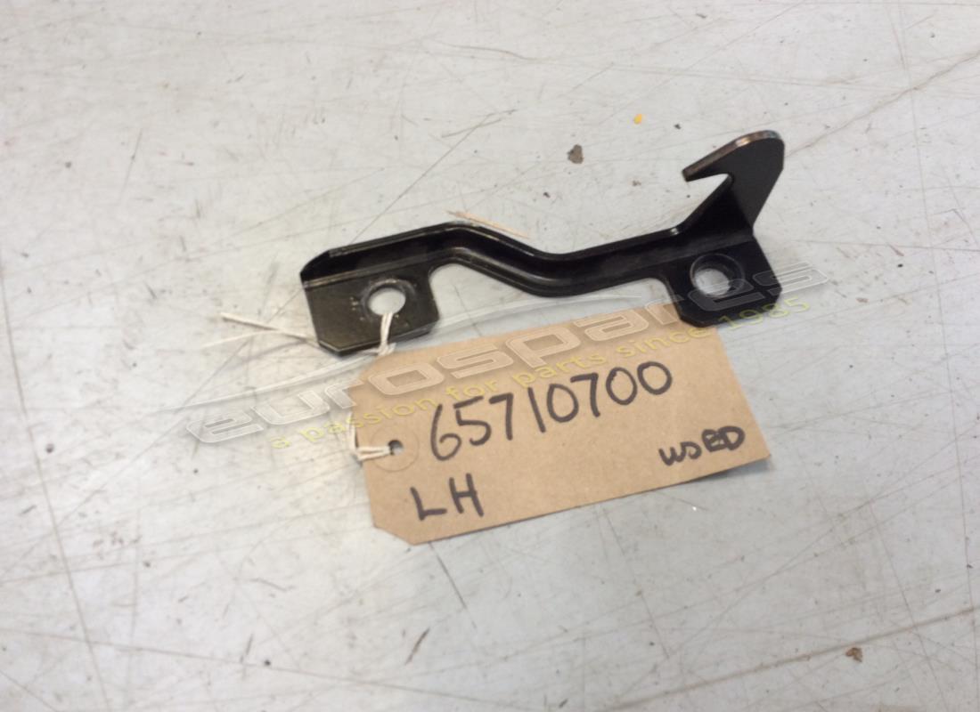 USED FERRARI LH BRACKET. PART NUMBER 65710700 (1) used ferrari lh bracket. part number 65710700 (1)
