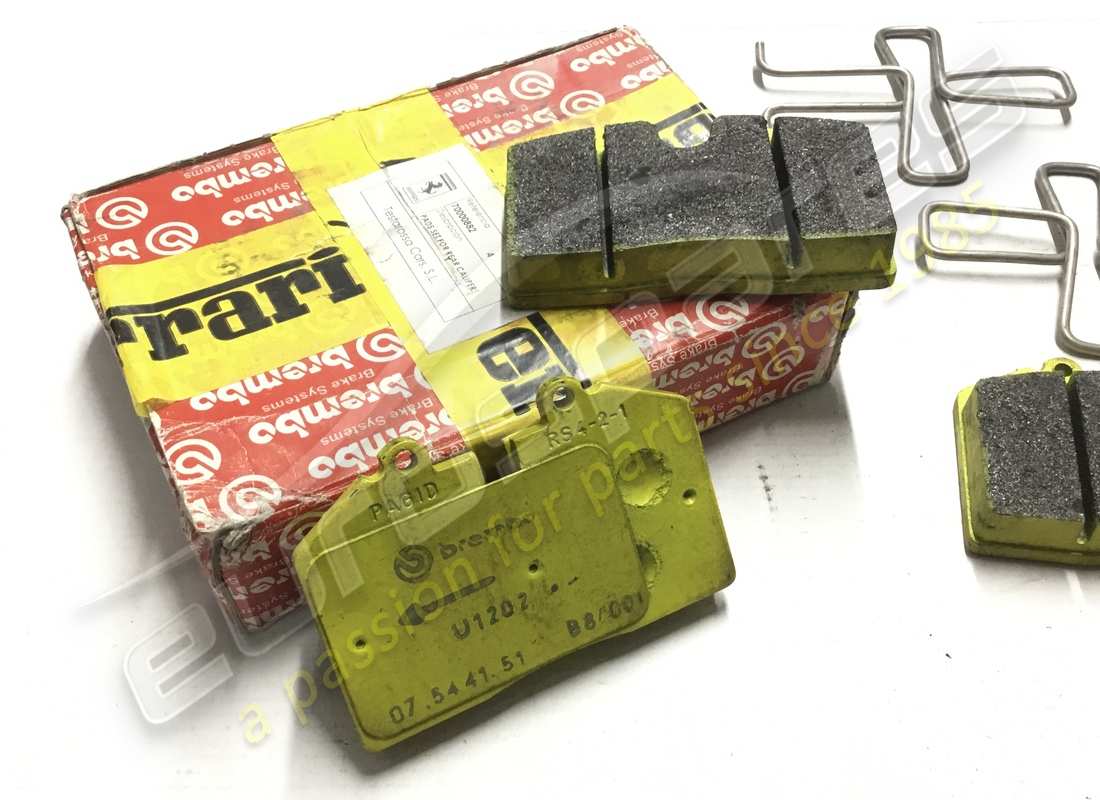 NEW FERRARI REAR BRAKE PAD SET (456GT&355FIORANO HP). PART NUMBER 70000882 (2) new ferrari rear brake pad set (456gt&355fiorano hp). part number 70000882 (2)