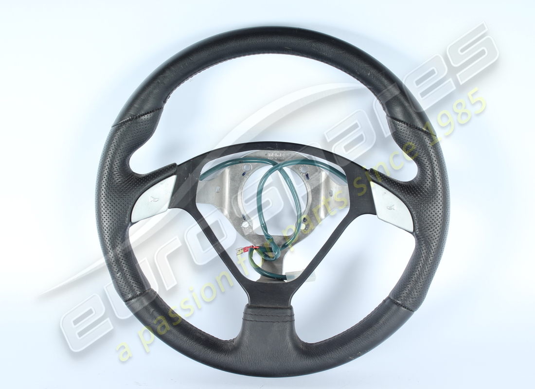 used ferrari complete steering wheel. part number 672875.. (2)