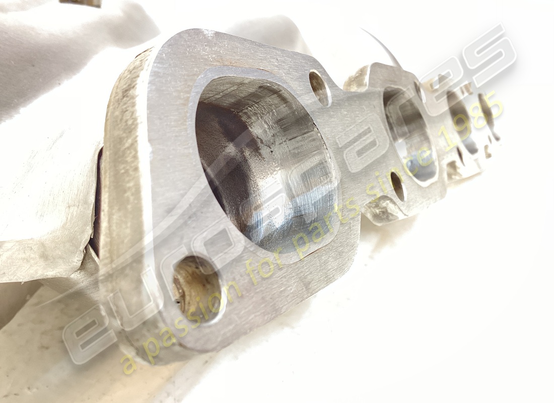 NEW FERRARI LH EXHAUST MANIFOLD. PART NUMBER 136276 (2) new ferrari lh exhaust manifold. part number 136276 (2)