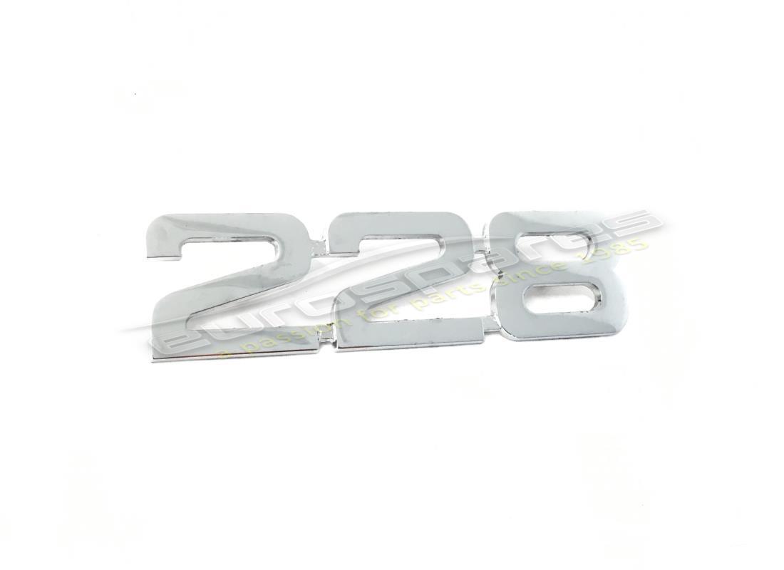 new maserati 228 emblem on lugg. comp. do. part number 348300363 (1)