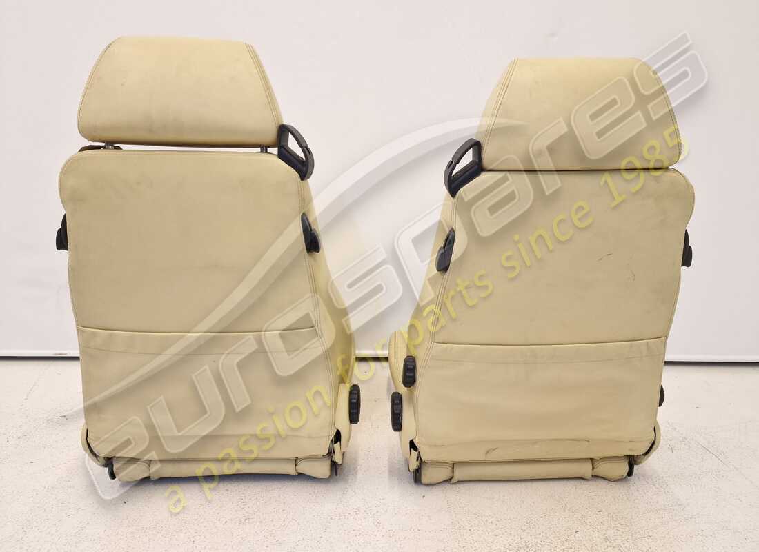 USED FERRARI PAIR OF CREAM SEATS. PART NUMBER 900114699 (3) used ferrari pair of cream seats. part number 900114699 (3)
