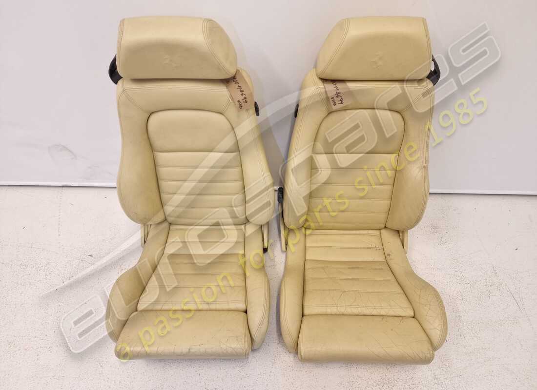 USED FERRARI PAIR OF CREAM SEATS. PART NUMBER 900114699 (2) used ferrari pair of cream seats. part number 900114699 (2)