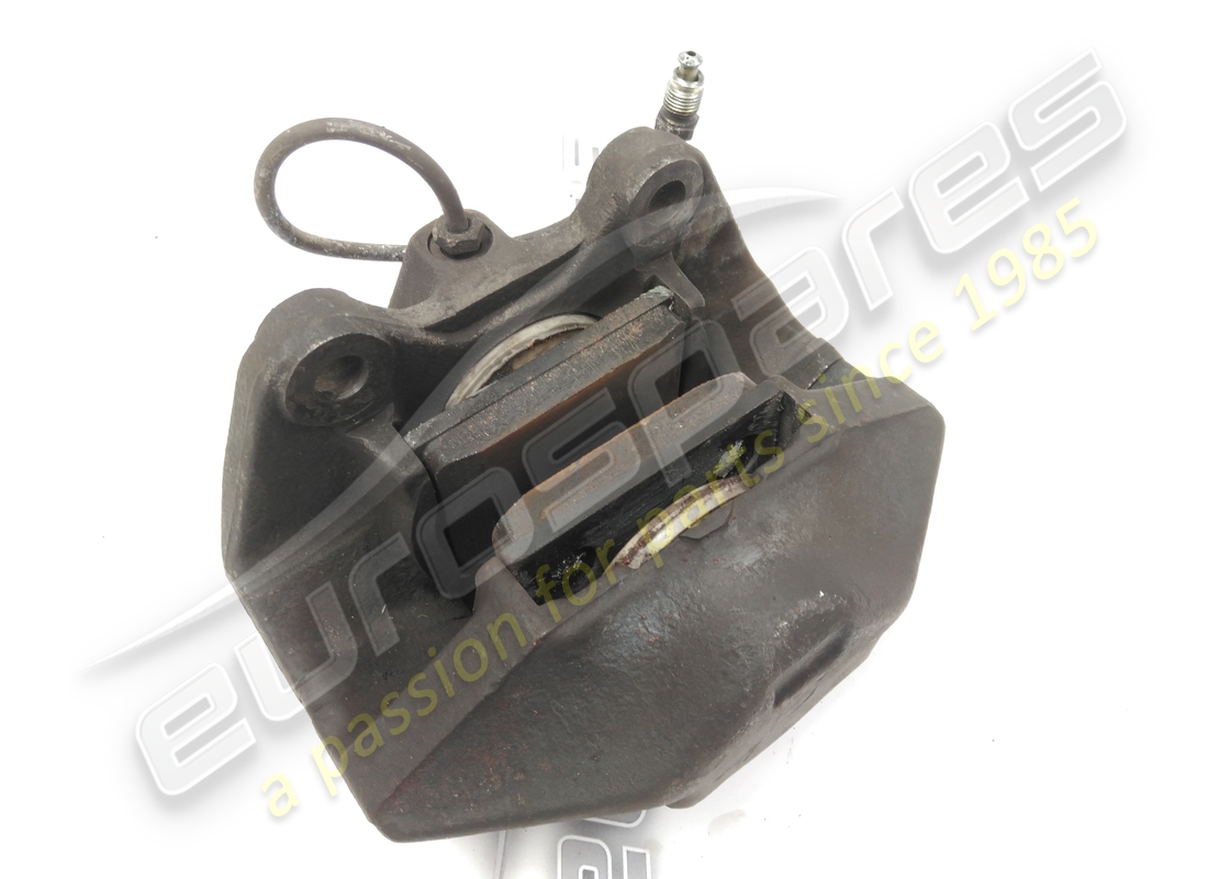 USED FERRARI LH FRONT BRAKE CALIPER ASSEMBLY. PART NUMBER 106358 (3) used ferrari lh front brake caliper assembly. part number 106358 (3)