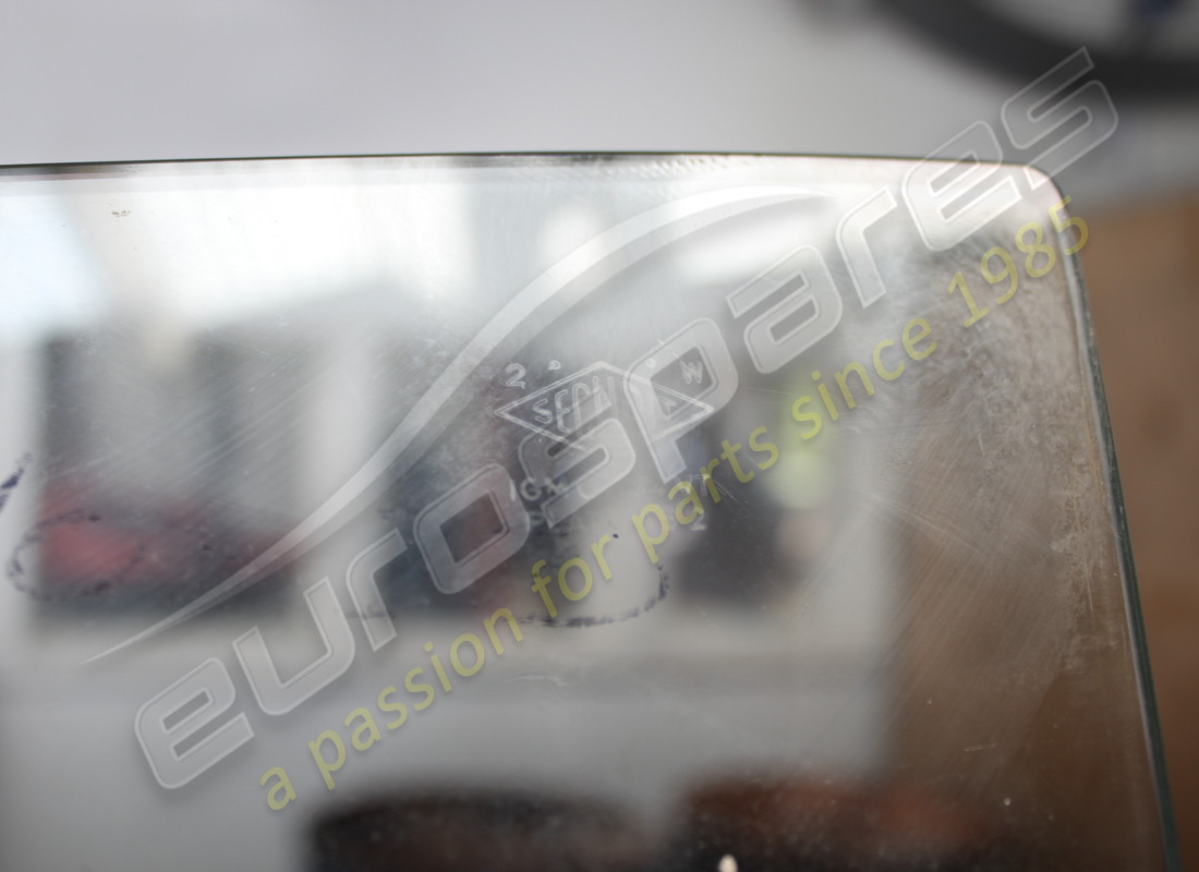 USED FERRARI DOOR GLASS. PART NUMBER 2393051000 (4) used ferrari door glass. part number 2393051000 (4)