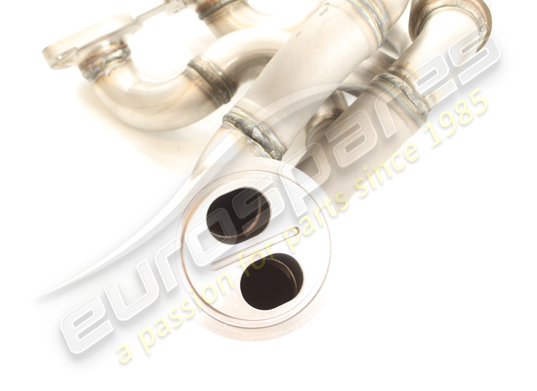 NEW FERRARI RH EXHAUST MANIFOLD. PART NUMBER 767450 (3) new ferrari rh exhaust manifold. part number 767450 (3)