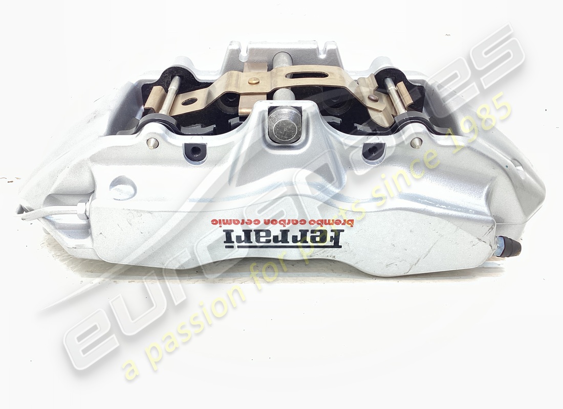 NEW FERRARI RH FRONT CALIPER UNIT WITH PADS. PART NUMBER 234488 (1) new ferrari rh front caliper unit with pads. part number 234488 (1)