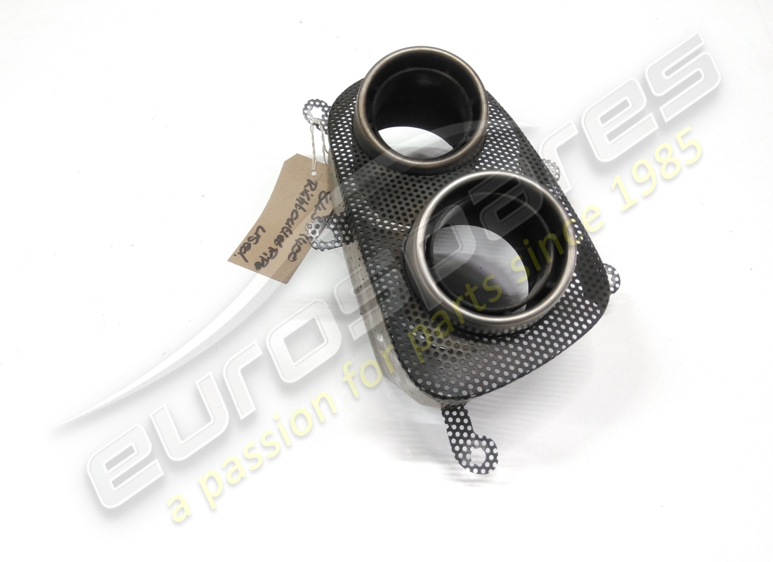 USED FERRARI GRILLE WITH RH TAILPIPES. PART NUMBER 84359400 (5) used ferrari grille with rh tailpipes. part number 84359400 (5)