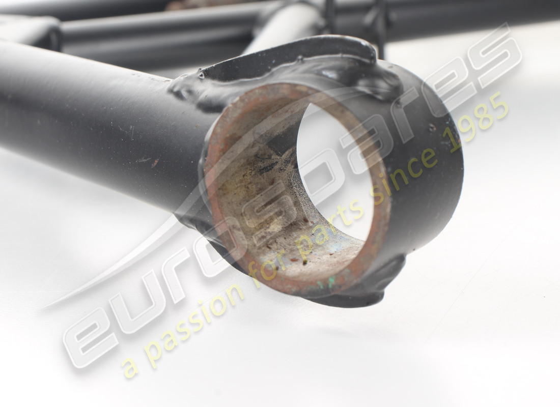 NEW FERRARI REAR LOWER LEVER. PART NUMBER 124304 (5) new ferrari rear lower lever. part number 124304 (5)