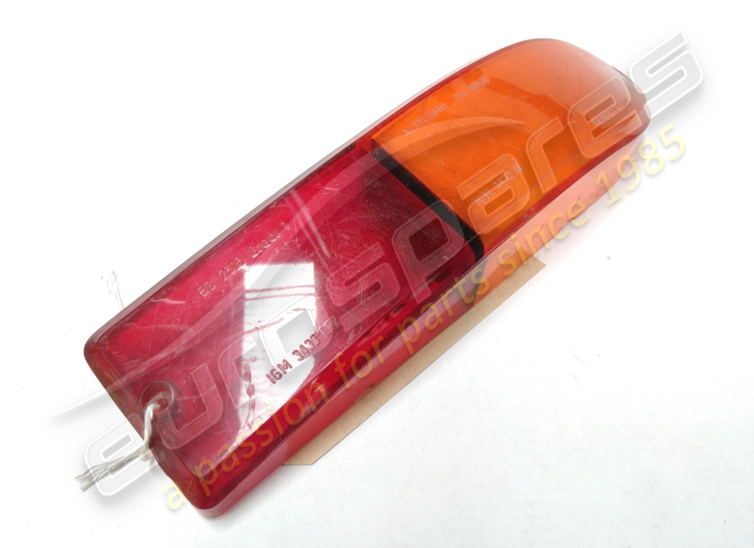 USED FERRARI RH REAR LAMP LENS AMBER/RED OE. PART NUMBER 2428234000 (2) used ferrari rh rear lamp lens amber/red oe. part number 2428234000 (2)