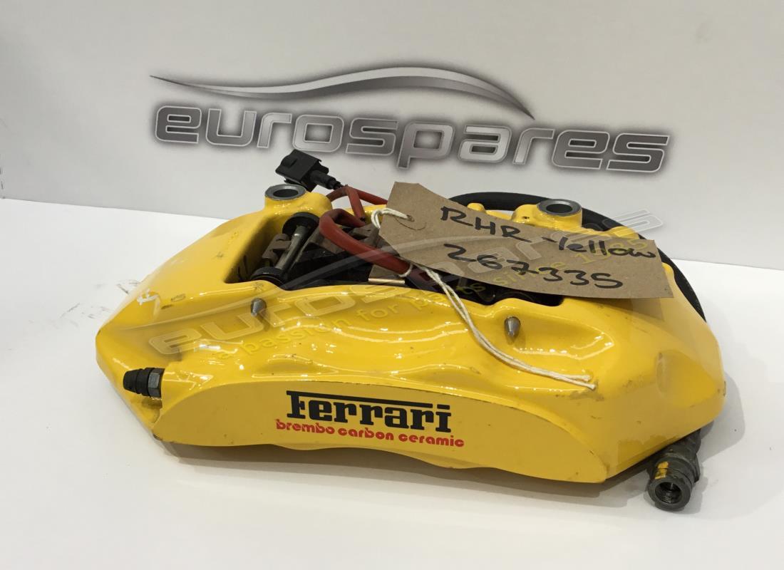 USED FERRARI RH REAR CALIPER WITH PADS YELLOW. PART NUMBER 267335 (1) used ferrari rh rear caliper with pads yellow. part number 267335 (1)