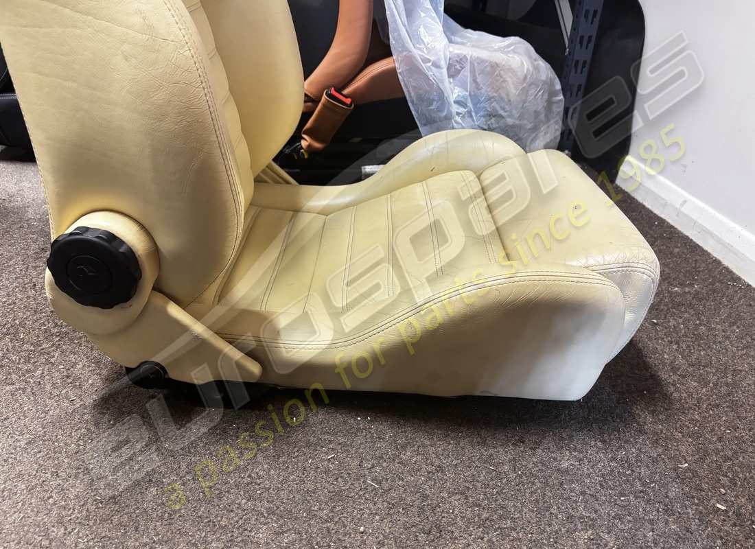 USED FERRARI PAIR OF CREAM SEATS. PART NUMBER 900114699 (4) used ferrari pair of cream seats. part number 900114699 (4)