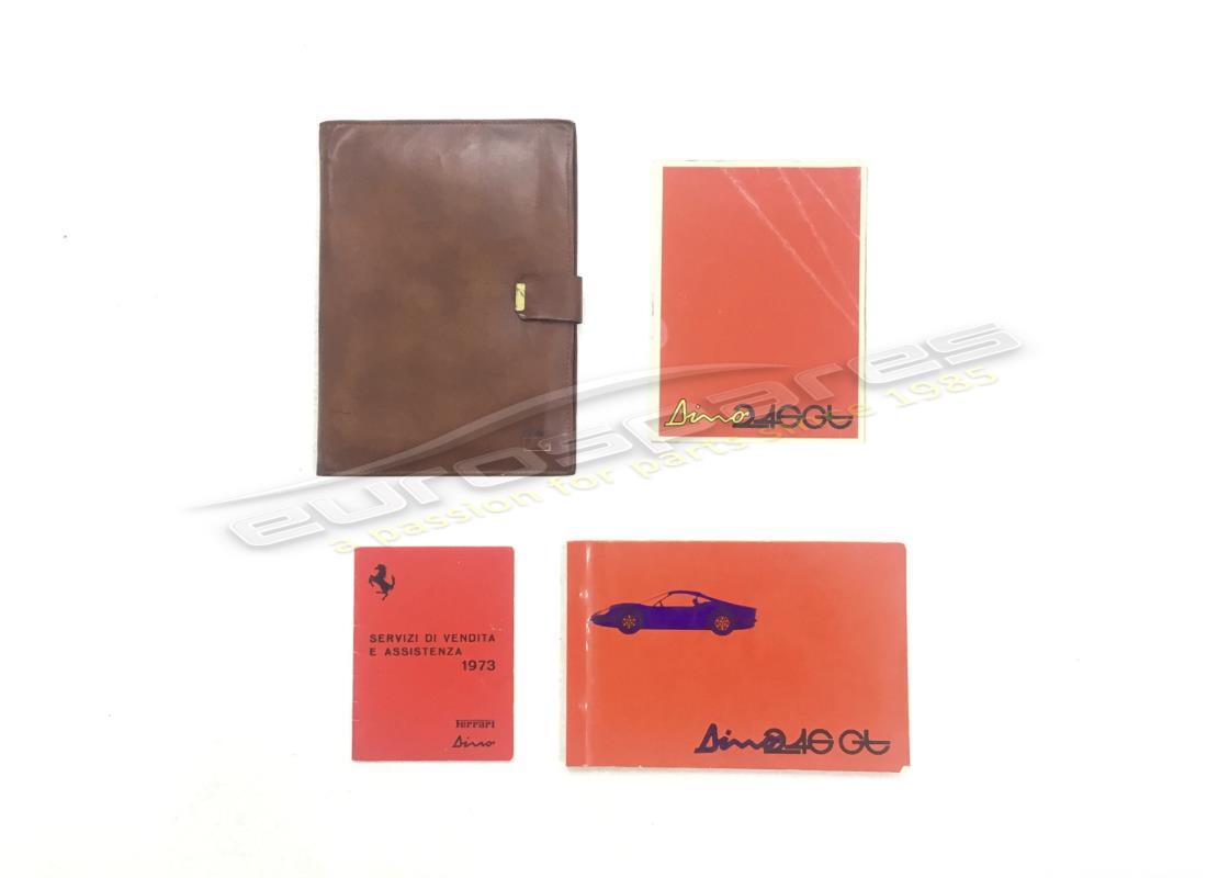 USED FERRARI 246 DINO ORIGINAL COMPLETE HANDBOOK MANUAL POUCH SET. PART NUMBER 9599001401 (1) used ferrari 246 dino original complete handbook manual pouch set. part number 9599001401 (1)
