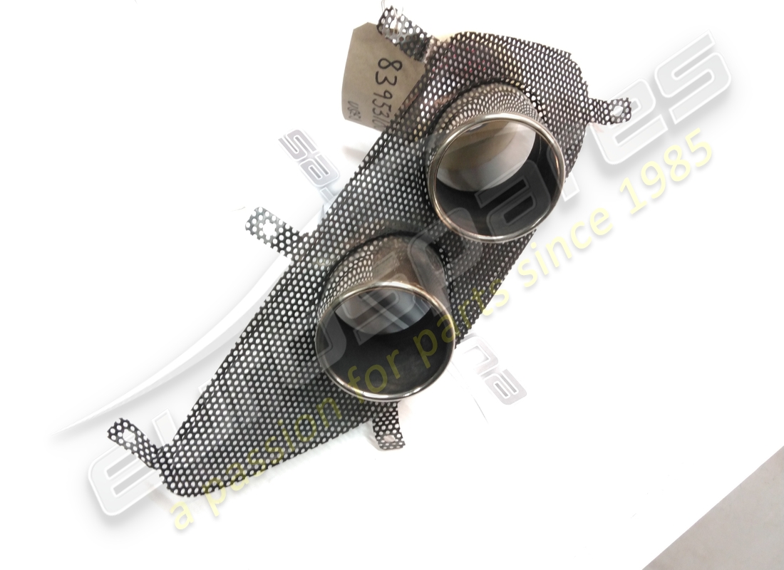 USED FERRARI GRILLE WITH RH TAILPIPES. PART NUMBER 83953100 (1) used ferrari grille with rh tailpipes. part number 83953100 (1)