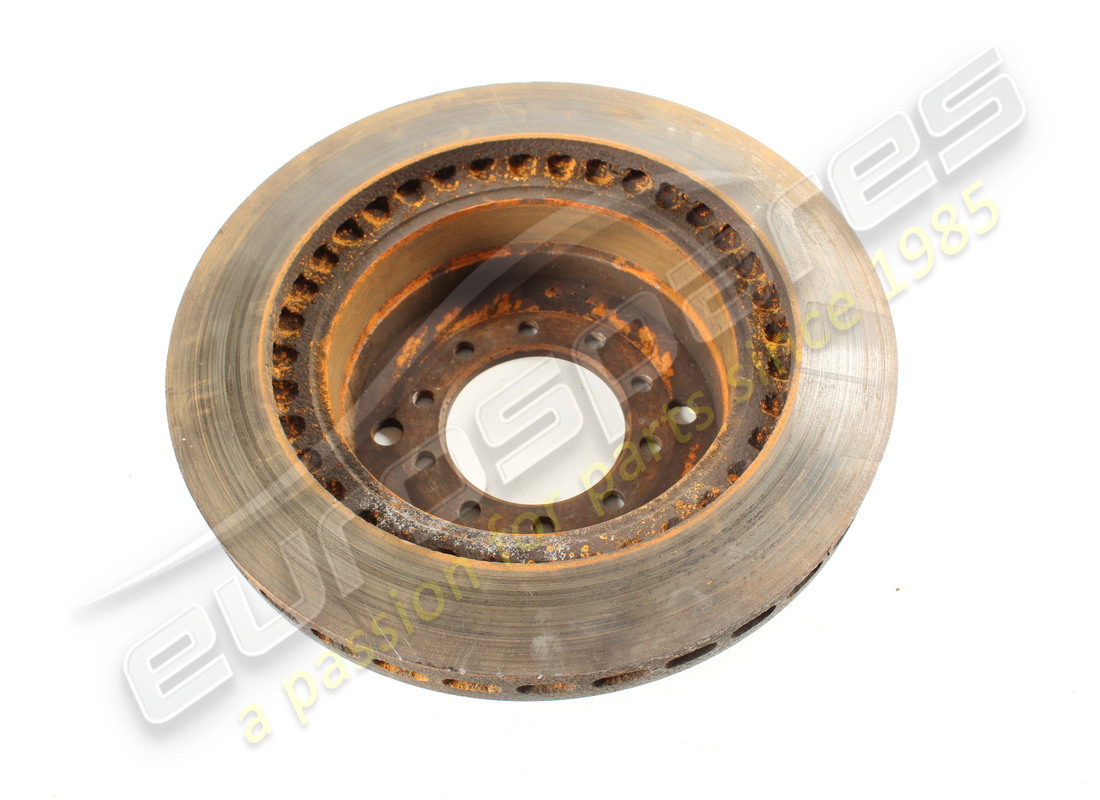 USED FERRARI REAR BRAKE DISC (CENTRE LOCK TYPE). PART NUMBER 125735 (1) used ferrari rear brake disc (centre lock type). part number 125735 (1)