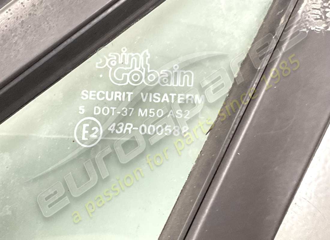 USED FERRARI LH DOOR GLASS FRAME GTS. PART NUMBER 60292109 (5) used ferrari lh door glass frame gts. part number 60292109 (5)