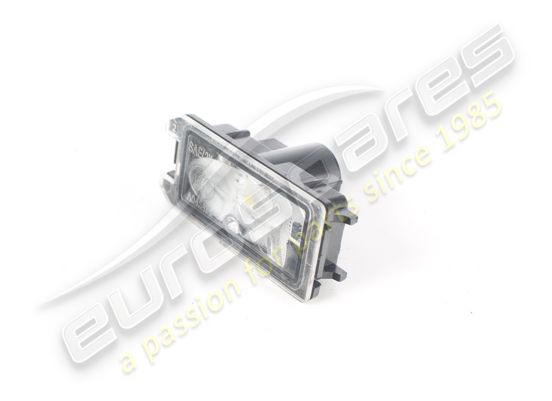 USED FERRARI LICENSE PLATE LIGHT/PUDDLE LAMP. PART NUMBER 318015 (2) used ferrari license plate light/puddle lamp. part number 318015 (2)