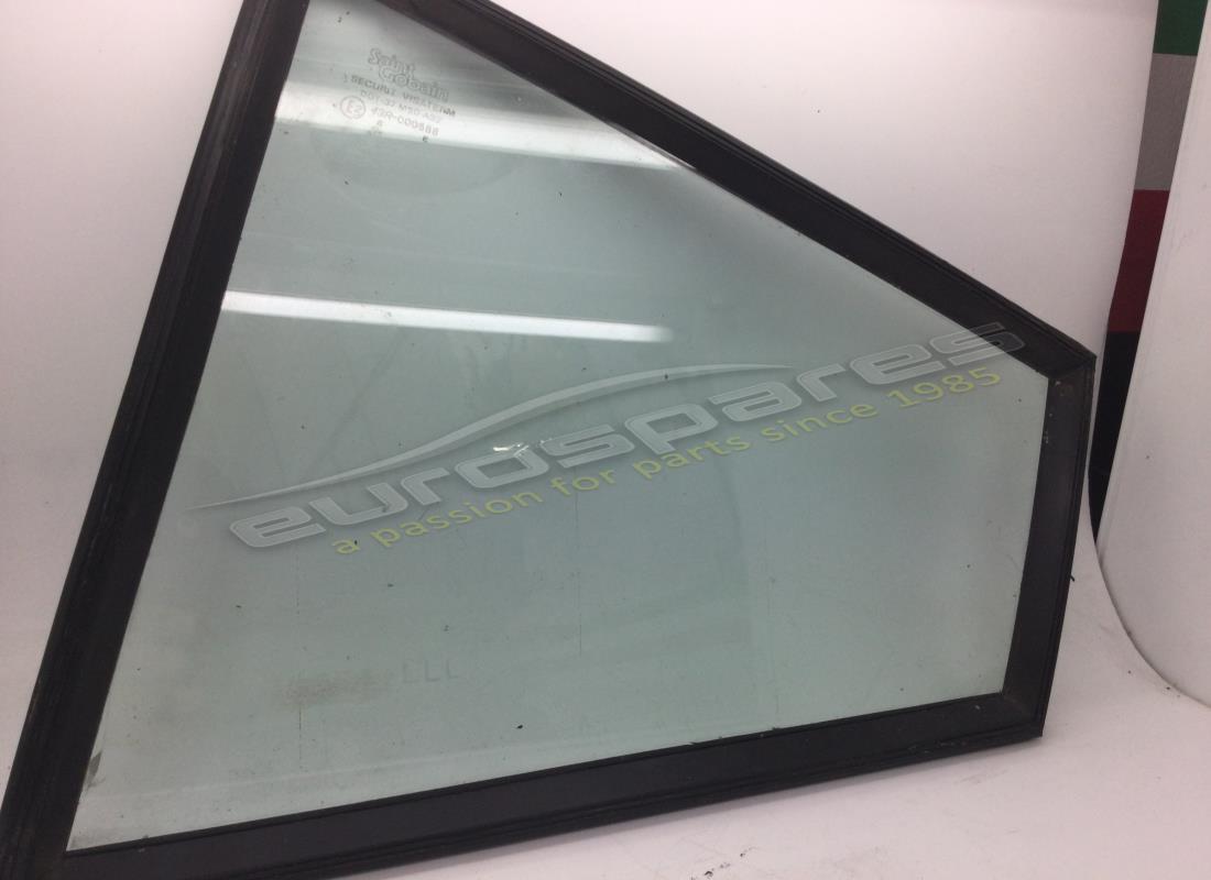 USED FERRARI LH REAR QUARTER LIGHT GLASS GTB. PART NUMBER 60265105 (1) used ferrari lh rear quarter light glass gtb. part number 60265105 (1)