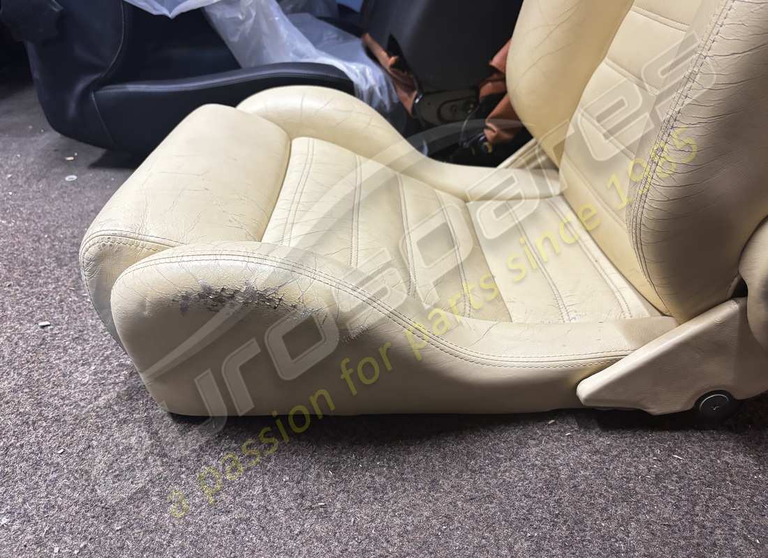 USED FERRARI PAIR OF CREAM SEATS. PART NUMBER 900114699 (6) used ferrari pair of cream seats. part number 900114699 (6)