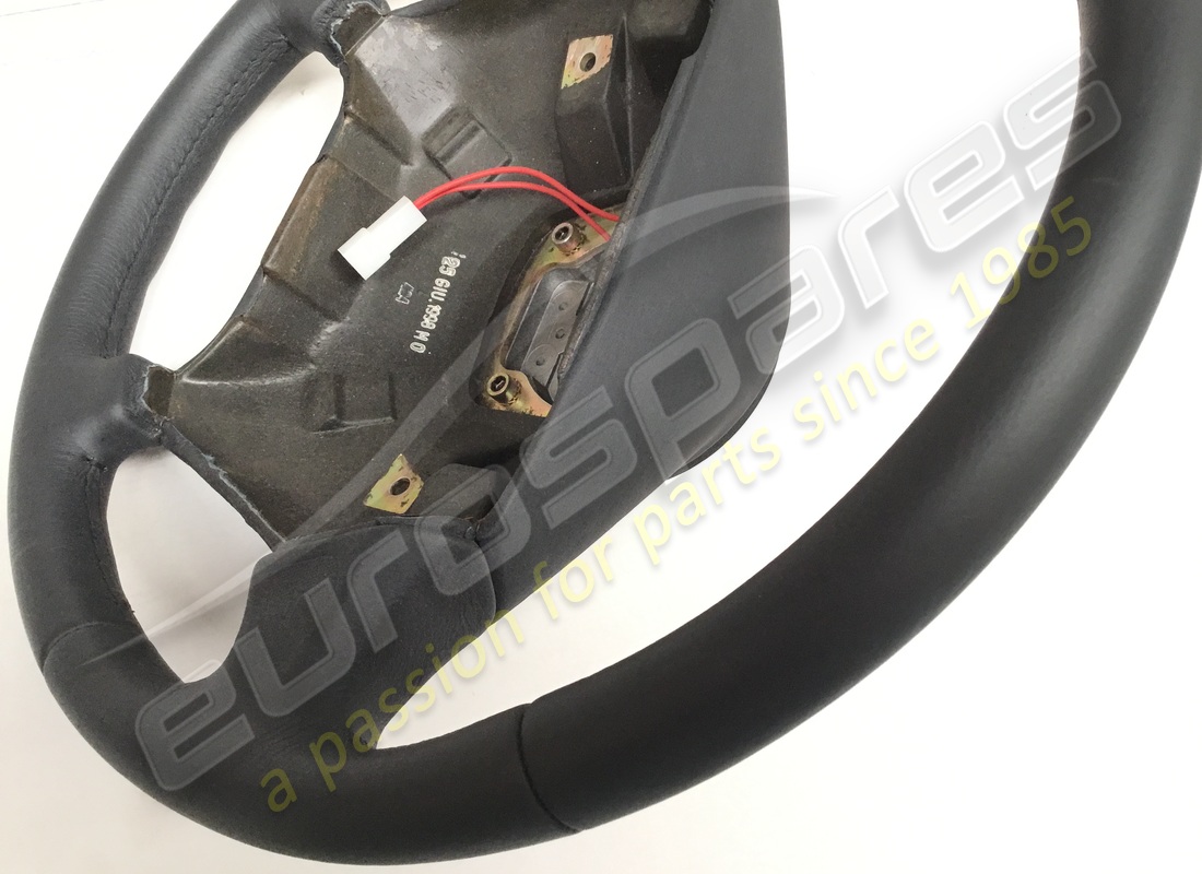 NEW FERRARI STEERING WHEEL IN DK BLUE LEATHER 3282. PART NUMBER 65846502 (4) new ferrari steering wheel in dk blue leather 3282. part number 65846502 (4)
