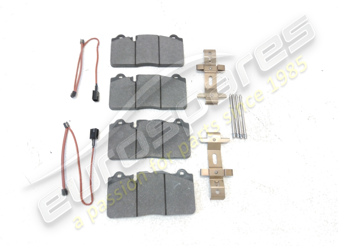 NEW FERRARI FRONT PAD SET WITH SPRING. PART NUMBER 70001840 (3) new ferrari front pad set with spring. part number 70001840 (3)