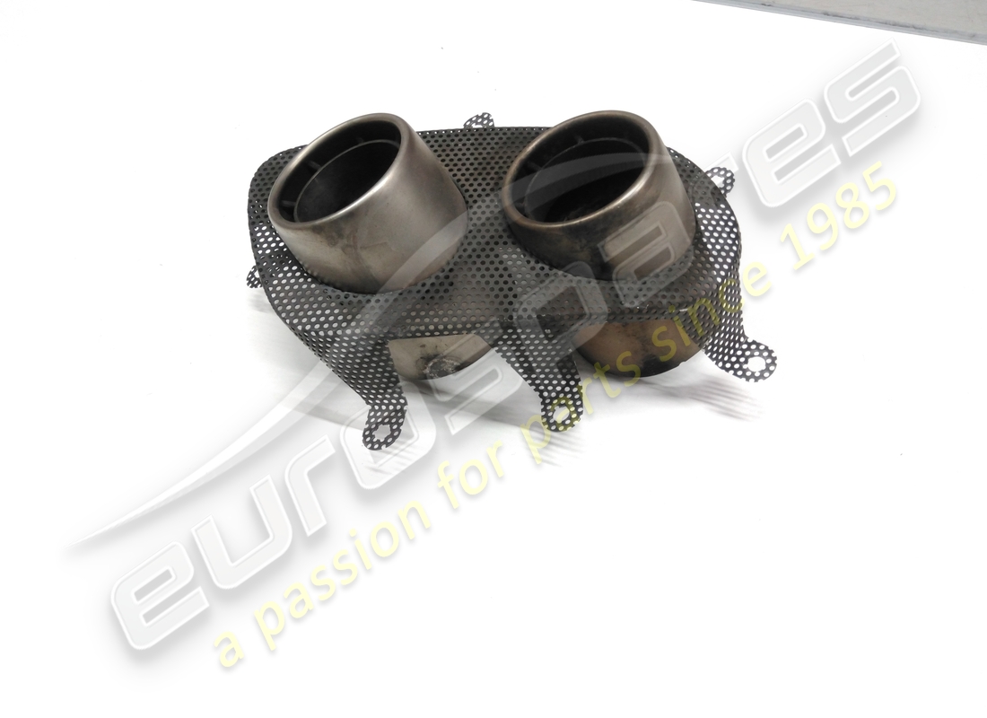 USED FERRARI GRILLE WITH RH TAILPIPES. PART NUMBER 84359400 (3) used ferrari grille with rh tailpipes. part number 84359400 (3)