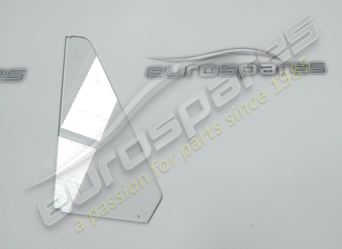 NEW FERRARI QUARTER GLASS. PART NUMBER 1353052800 (1) new ferrari quarter glass. part number 1353052800 (1)