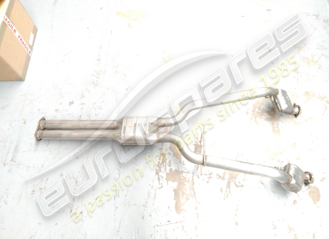 NEW MASERATI MANIFOLD WITH CATALYTIC CONVERTER. PART NUMBER 389005104 (1) new maserati manifold with catalytic converter. part number 389005104 (1)