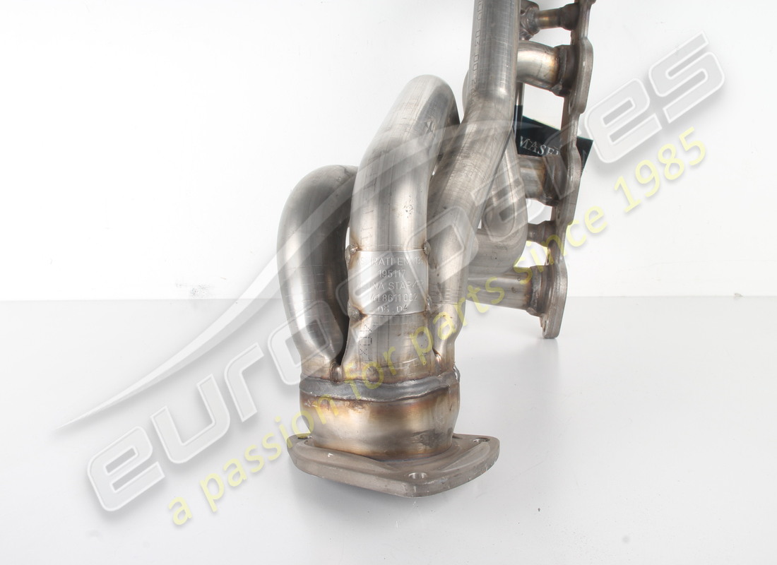 NEW MASERATI COMPLETE RH EXHAUST MANIFOLD. PART NUMBER 195117 (4) new maserati complete rh exhaust manifold. part number 195117 (4)